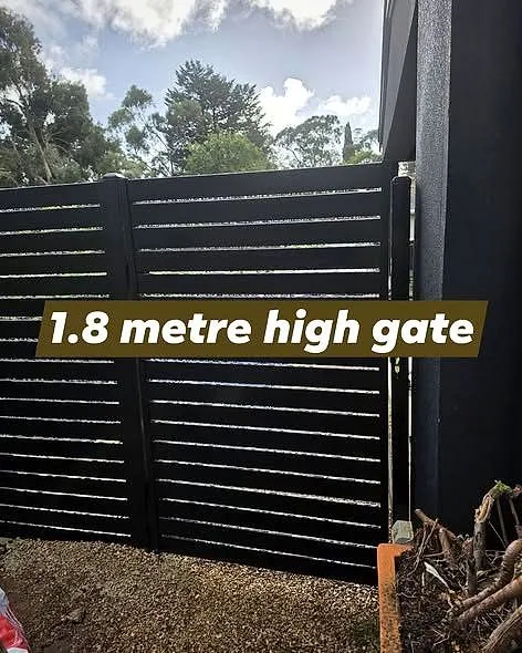 1.8 metre high dark slat gate