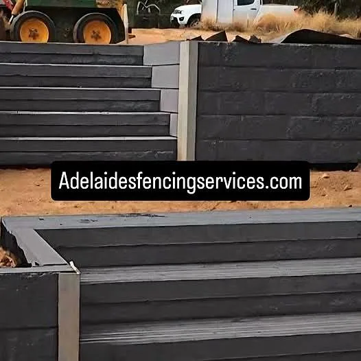 Adelaide Fencing Services concrete sleeper retaining wall on a job site